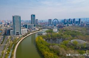Aerial Footage of the Xiaoqing River Section in Jinan's Small Qing River Bridge Area, Lush Greenery and Beautiful Environment on Both Banks