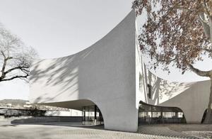 Pure White Volume on Paving Stones, Reflecting the Historical Charm of Ancient Town