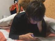Owner Lies on the Bed Playing on His Phone, Cat Sneaks Out from Collar, Cat Says: 'Don't Ignore Me!'