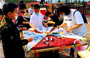 Spinning Windmills, Flying Kites, and Swings: Let's Go to Wudang Flower Painting Town!