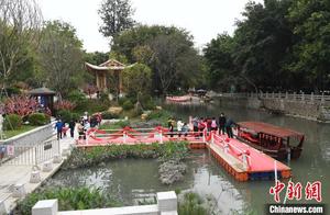 Citizens Enjoy Spring Scenery on the White Horse River by Cruise Ship