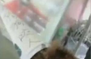 Teddy Hung at the Store Entrance, Wearing a Hat with the Words ‘Dog Bites People’