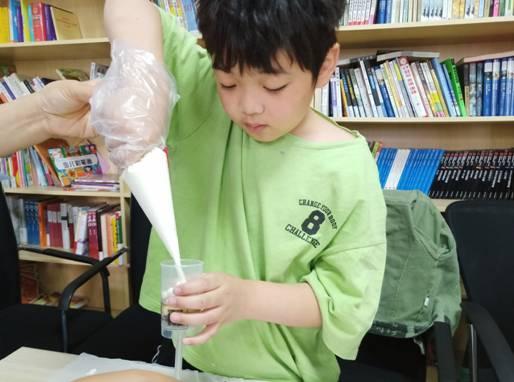 你的育儿经|“这个六一有点甜” 南京江北新区新华一村社区举办亲子烘焙活动
