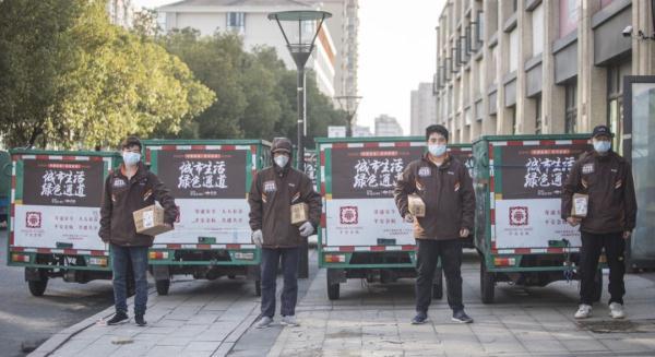 『光明网』杭州发布新规：快递、外卖可以进小区了
