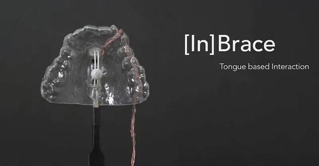 戴上这个神奇牙套，舌头就能当鼠标