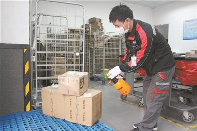 #光明网#网点对快递件两次消毒