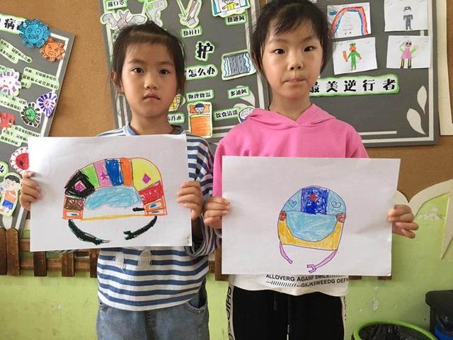 你的育儿经|一路平安，多“盔”有你——小越街道中心幼儿园开展安全宣传活动之头盔佩戴行动