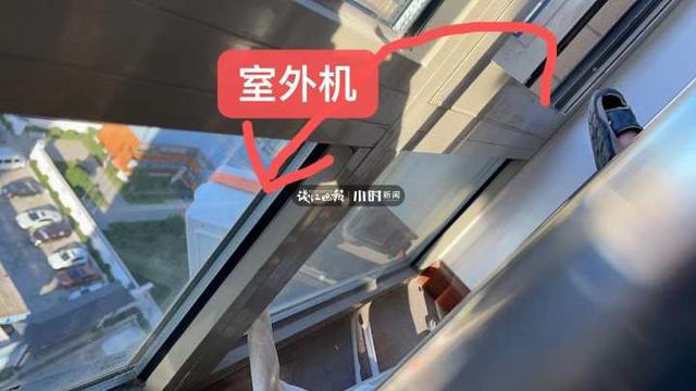 空调|拎着一只空调室外机，两位装机师傅在杭州15楼的窗外“凌空微步”挥汗如雨