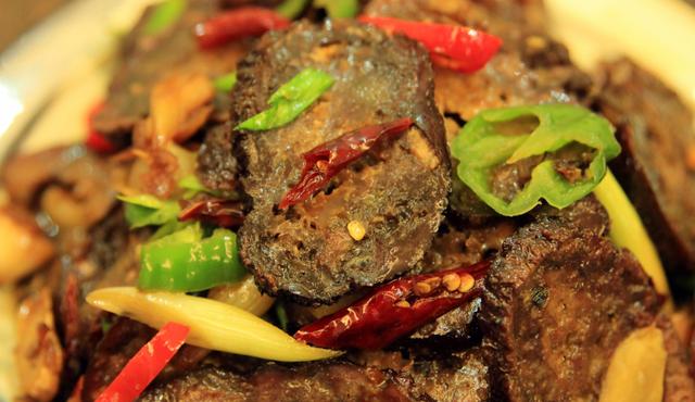 湖南人从小吃到大的“黑暗美食”，是北方人得不到的快乐，香极了