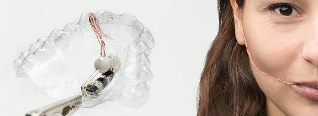 戴上这个神奇牙套，舌头就能当鼠标