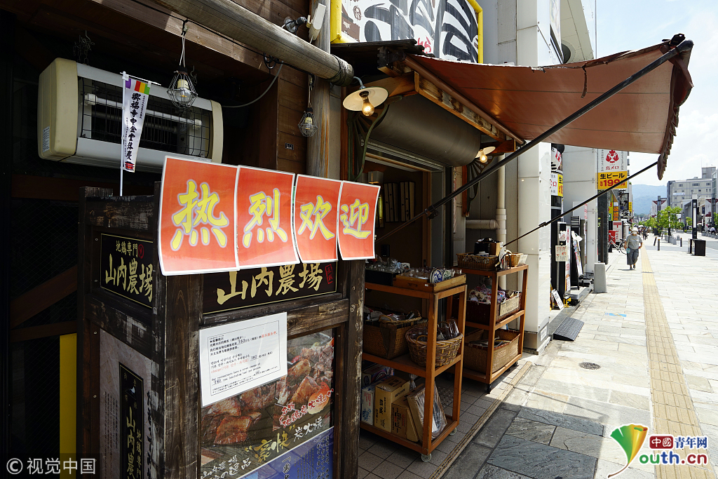 日本迎来暑期旅游旺季 商家打中文广告迎客