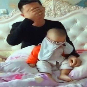 宝妈让宝爸给宝宝穿衣服，半天没动静，眼前的画面让宝妈笑岔气